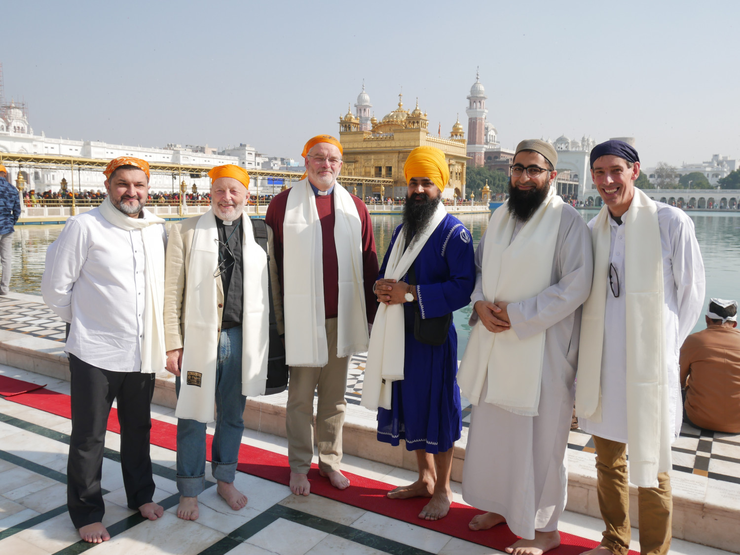 A group of men of different faiths at the Golden Temple in Amritsar