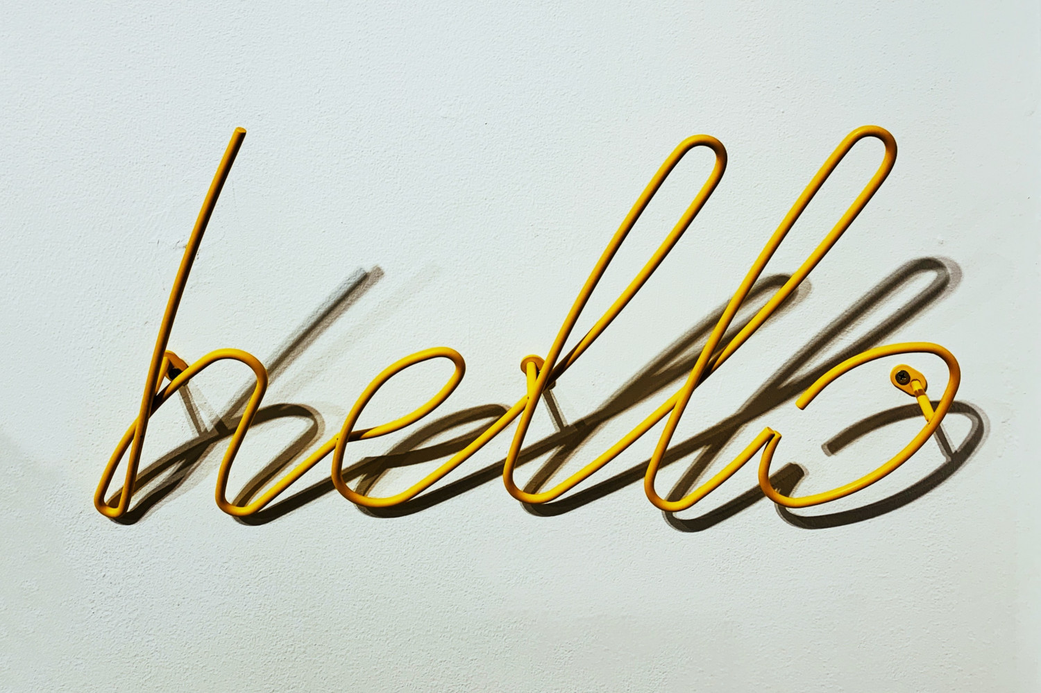 Image of a sign that reads 'hello'
